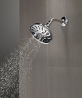 H2Okinetic 5 Setting Raincan Shower Head With Massage Full Body Spray Chrome Finish in use, mounted on gray tiled wall
