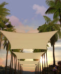 Beige 8 By 10 Rectangle Shade Sail Heavy Duty Outdoor Canopy With UPF50 Sunshade 200GSM HDPE installed above palm trees