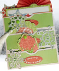Christmas themed card made with Stitched Slots Pocket Die Cut Set For Card Making And Scrapbooking, decorated with snowflakes and tassel.