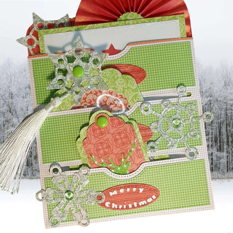 Christmas themed card made with Stitched Slots Pocket Die Cut Set For Card Making And Scrapbooking, decorated with snowflakes and tassel.