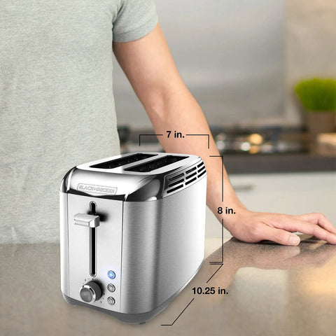 2-Slice Stainless Steel Toaster With Extra Wide Slots Rapid Toast Technology on kitchen countertop with person beside it
