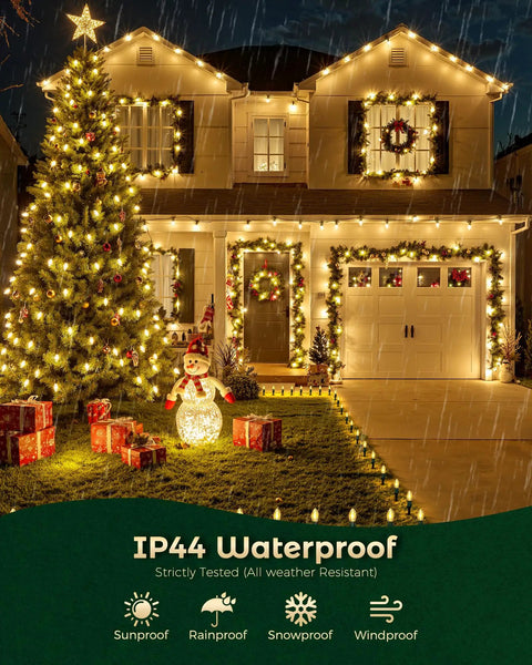 Outdoor Christmas Pathway Lights 2 Pack, 51.4 Ft Total, 40 Bulbs, Waterproof Walkway Lights illuminating a decorated house and garden