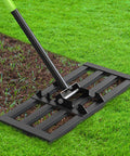 Heavy Duty Lawn Leveling Rake With Six Point Five Foot Steel Handle 17 By 10 Inch Leveling Tool on grass lawn