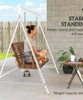 Heavy Duty Metal Porch Swing Stand For Outdoor Use 528 Lb Weight Capacity A Frame Hanging Chair Stand For Backyard Patio Lawn Playground White Stand Only shown with a brown wooden swing and person seated.