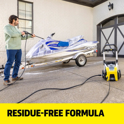 Man using All In One Vehicle Wash And Wax Soap For Pressure Washers Heavy Duty Clean And Shine Universal Fit on a jet ski