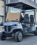 Heavy Duty Four Seater Electric Golf Cart With Premium Luxury Seats And Badass Off Road Tires Straight Fire Backyard Cruiser featuring a sleek gray design and HD LED display.