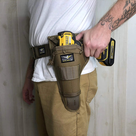 Side view of person wearing Aims Large Drill Holster for Left Handed Pros Handcrafted in the USA, fits a power drill, made from 1000D Cordura Nylon.