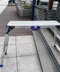 All In One Work Platform 39 By 12 Inch, 50 Gear Height Adjustable Aluminum Step Ladder 25 To 35 Inches, outdoor setup
