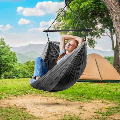 Hanging Hammock Chair Outdoor Swing For Camping And Travel, Collapsible Tree Pod Style Hammock With Side Pocket in use outdoors