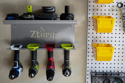 Cordless Drill Tool Organizer Wall Mount Charger and Storage Rack for Garage Organization Drill Holder Power Tool Shelf Battery Dock Pegboard Friendly Keeps Your Tools Neat and Ready installed on wall with drills and pegboard