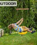 Child playing on a 3 In 1 Kids Swing Set With Monkey Bars And Rainbow Rope, Adjustable Swing, Carabiner, in a backyard setting.