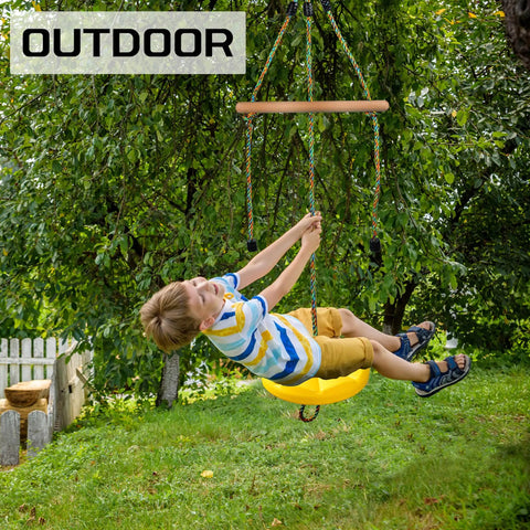 Child playing on a 3 In 1 Kids Swing Set With Monkey Bars And Rainbow Rope, Adjustable Swing, Carabiner, in a backyard setting.