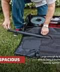 Person packing a two-burner stove into a carry bag for two burner stoves heavy duty case with weather resistant liner.