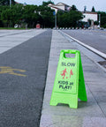 Bright Green Slow Down Kids At Play Sign For Street Caution Children Playing Outdoor Safety Sign for driveways and roads