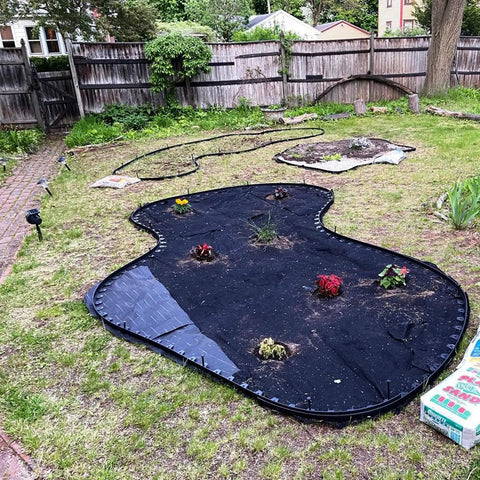 40 Ft Garden Landscape Edging Kit With 40 Spikes Black 2 Inch Tall Paver Edging For Lawn Borders installed in a garden