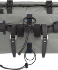 Mule 12 Bikepacking Waterproof Handlebar Bag With Roll-Top Design showing secure straps and mounting system.