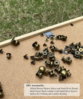 Top Shelf Bronze Button Stud Screws Kit Packs 36 Heavy Duty Rivets In Four Exact Sizes For Tough Leather Work And Badass Diy Builds Giving You A Slick Rust Proof Zinc Finish, brass button spikes on a cork board.