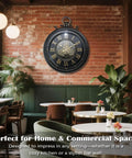 24 Inch Moving Gear Wall Clock Oversized Industrial Steampunk Decor With Big Numerals Carbon Black Finish mounted on brick wall in cafe.