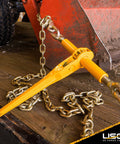 2 Pack Heavy Duty Ratchet Load Binders for 3/8 to 1/2 Inch Grade 70 Chain in use on flatbed with tight chain securing equipment