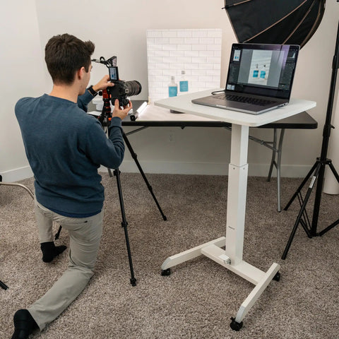 Photographer using Adjustable Rolling Laptop Desk With Wheels For Home Office Or Classroom Sit Stand Cart On The Go Mobility