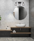 Wicker Park 3-Light Vanity Light Fixture In Weathered Pewter With Old Satin Brass Accents above modern bathroom sink