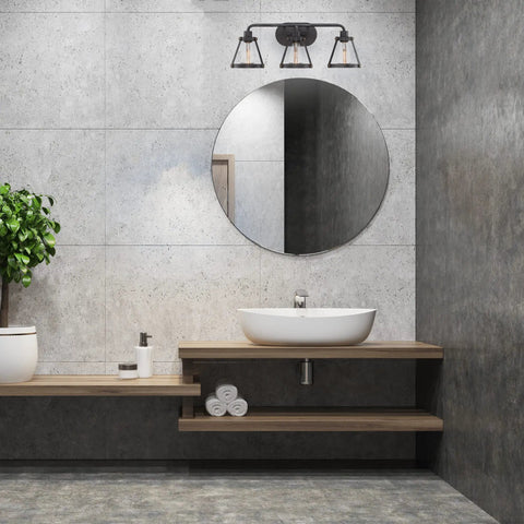 Wicker Park 3-Light Vanity Light Fixture In Weathered Pewter With Old Satin Brass Accents above modern bathroom sink
