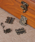 20 Pack 1.2-Inch Antique Cabinet Door Hinges With Screws Set for DIY Furniture Repair shown with wooden box on burlap fabric