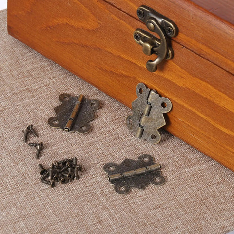 20 Pack 1.2-Inch Antique Cabinet Door Hinges With Screws Set for DIY Furniture Repair shown with wooden box on burlap fabric