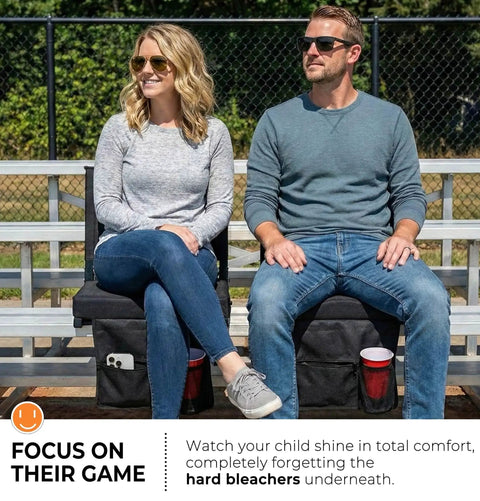Couple seated on Comfy Stadium Bleacher Seat With Back Support And Thick Padded Cushion Includes Shoulder Strap Black Standard Size One Piece