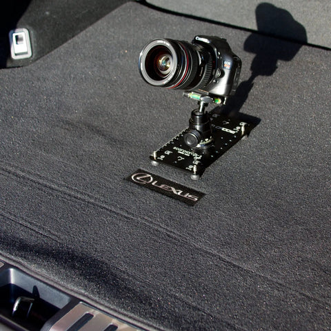 Hassle Free Setup Backpack Ready Low Profile Cheese Plate Mount For Seamless Camera Rigging Compact Flat Tripod Adapter For Dslr Mirrorless Action Cam Creators On The Go on a car trunk.