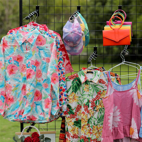 10 Pack Gridwall Waterfall Hooks With 12 Inch 6 Ball Faceouts holding floral shirts and hats for retail display outdoor setup