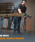 Person using a 36-inch high Portable Folding Workbench for Garage and Shop, Heavy Duty 6000lb Capacity, 4x8 ft Work Surface