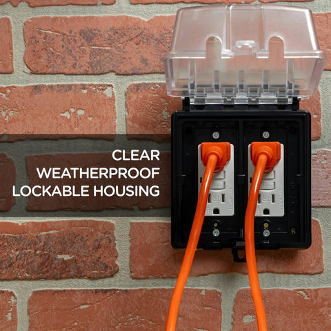 Outdoor Electrical Outlet Cover, Dual Gang Weatherproof Enclosure For Wet Locations, mounted on brick wall with clear cover.