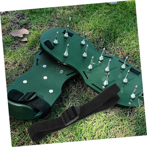 Eight Piece Lawn Aerator Shoes With Heavy Duty Straps And Spikes For Garden And Patio on grass, showing spikes and strap detail