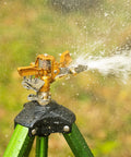 Impact Sprinkler With Tripod Base For Lawn And Garden, Pro Grade 360 Degree Coverage, Heavy Duty Brass Sprinkler Head spraying water