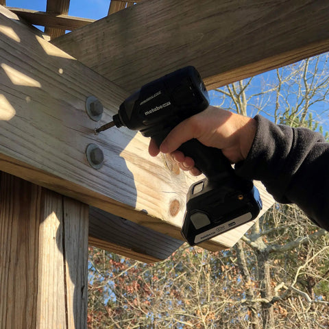 18V Cordless Impact Driver With 1522 Inch Pounds Of Torque 3100 RPM And 3400 IPM Ultra Lightweight At 2.9 Lbs in use on wood