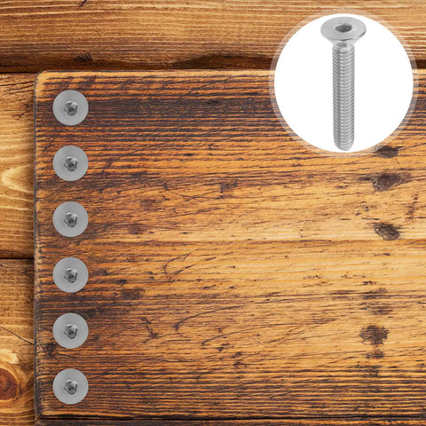 Ten Pack Stainless Steel Flat Head Socket Screws 5/16-18 X 2 Full Thread Heavy Duty Fasteners on wooden surface