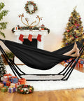 Portable Hammock Chair With Stand For Travel Backpacking Beach And Backyard 550 Lb Capacity Easy Setup shown near fireplace