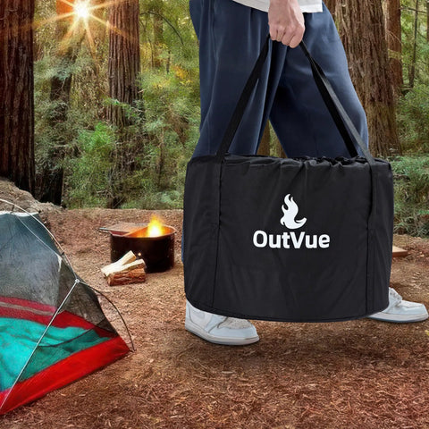 Person carrying tote bag with Stainless Steel Smokeless Fire Pit 19.5 Inch Outdoor Bonfire With Tote Bag And Fire Poker