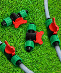 1/2 Inch Universal Drip Irrigation Shut Off Valve Set For Tubing Coupling Locking Fittings on green grass