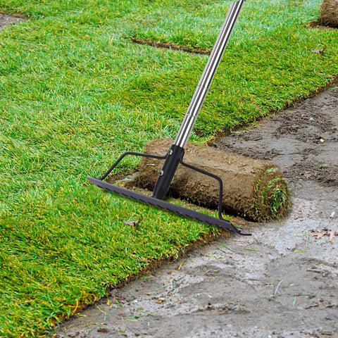 15 Inch Wide Bow Rake With 16 Steel Tines And Stainless Steel Handle For Loosening Soil Leveling Mulch Gathering Leaves And Lawn Care Built Tough Garden Tool on grass