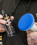 Close-up of Drill Activated Scratch Removal Kit for Light Car Scratches including ScratchX 2.0 and 4 inch pad in hand