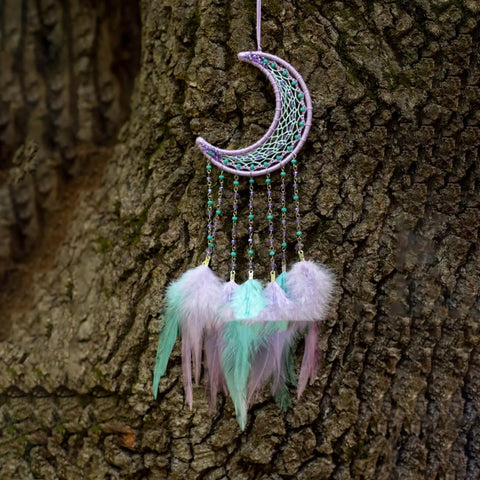 Crescent dream catcher with pastel feathers hanging on tree, using 8 Pcs Metal Moon Frame Hoops In Four Sizes For Dream Catchers