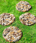 Polished River Rock Stepping Stones For Garden Pathway With Mesh Backing Nine Inch Pebble Paver Mats on lawn