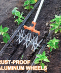 Rotary Cultivator Garden Tiller with Adjustable Stainless Steel Handle in action, rust-proof aluminum wheels, soil aeration in garden.