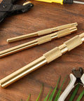 Brass Drift Punch Set, 3 Piece, Three Sizes Three Quarter Inch, One Half Inch, and Three Eighth Inch, Pro Grade on wooden surface