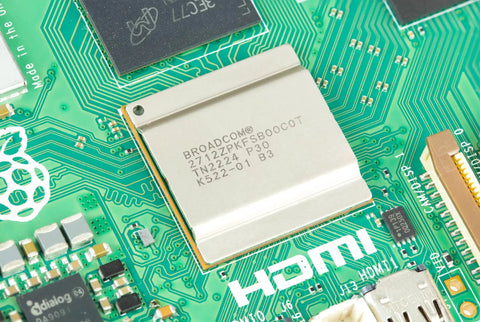 Close-up of ARM processor on Beefed-Up 8GB RAM Single Board Computer for Makers and Media Buffs, showcasing chip details.