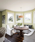 Bulletin 3 Light Pendant With Cork Shade In Brushed Steel Finish over dining table in bright corner room