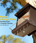 Weatherproof Metal Wall Mounted Bird Feeder With Heavy Duty Roof And Detachable Easy Clean System installed on a tree