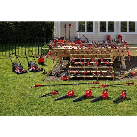 Landscaped backyard with various red power tools, including Beast Bright 2500 Lumen LED Work Light Cordless Spotlight Handheld Rechargeable.